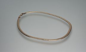 A 9ct gold flat link chain necklace with lobter claw fastening: l. x 19cm 21.51g
