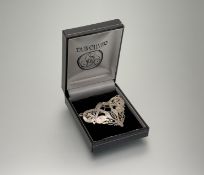 A Douglas Scott of Tain silver Lindesfarne brooch: h. x 4cm l. x 6cm Edinburgh 2004 with original