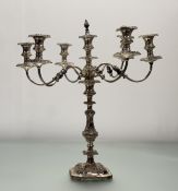 A substancial Victorian-style epns seven branch candelabra, the central baluster column with c