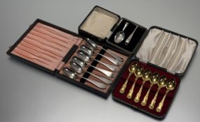 A Birmingham silver child christening set comprising a spoon and pusher with engraved inscription