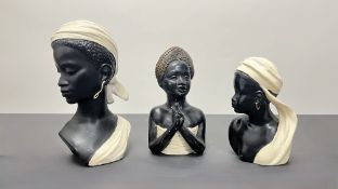 A set of three Duron Mid Century painted busts of ladies with head scarves and pieces (largest h.