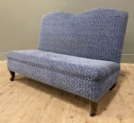 A 19th century two-seater sofa, of small proportions, with twin arched top over upholstered back and