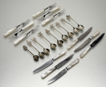 A Firths of Sheffield set of six pairs of stainless steel mother of pearl handled pastry fork and