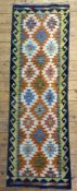 A modern hand-knotted chobi kilim runner, central panel with repeating geometric diamond pattern