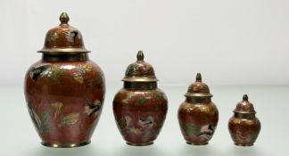 A graduated group of four cloisonne burnt orange with leaf and floral enamelling miniature ginger