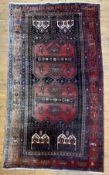 A hand-knotted North West Persian carpet, central panel with two geometric medallions on a deep navy