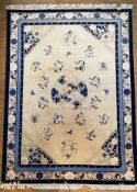 A modern Chinese Peking wool carpet, central circular medallion surrounded by stylized flowerhead