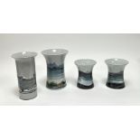 A collection of Highland Stoneware vases comprising a pair of short fluted vases decorated with