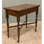 An Edwardian mahogany fold-over card table, rectangular top enclosing green baize card surface,