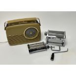 A Bush vintage two-tone brown plastic cased radio with swing handle (untested), together with a