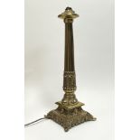 A late 20thC brass Corinthian column table lamp in the Neoclassical style, featuring a fluted column