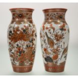 A pair of late 19thc Japanese Kutani ware vases, with a chrysanthemum and bird scene to body with