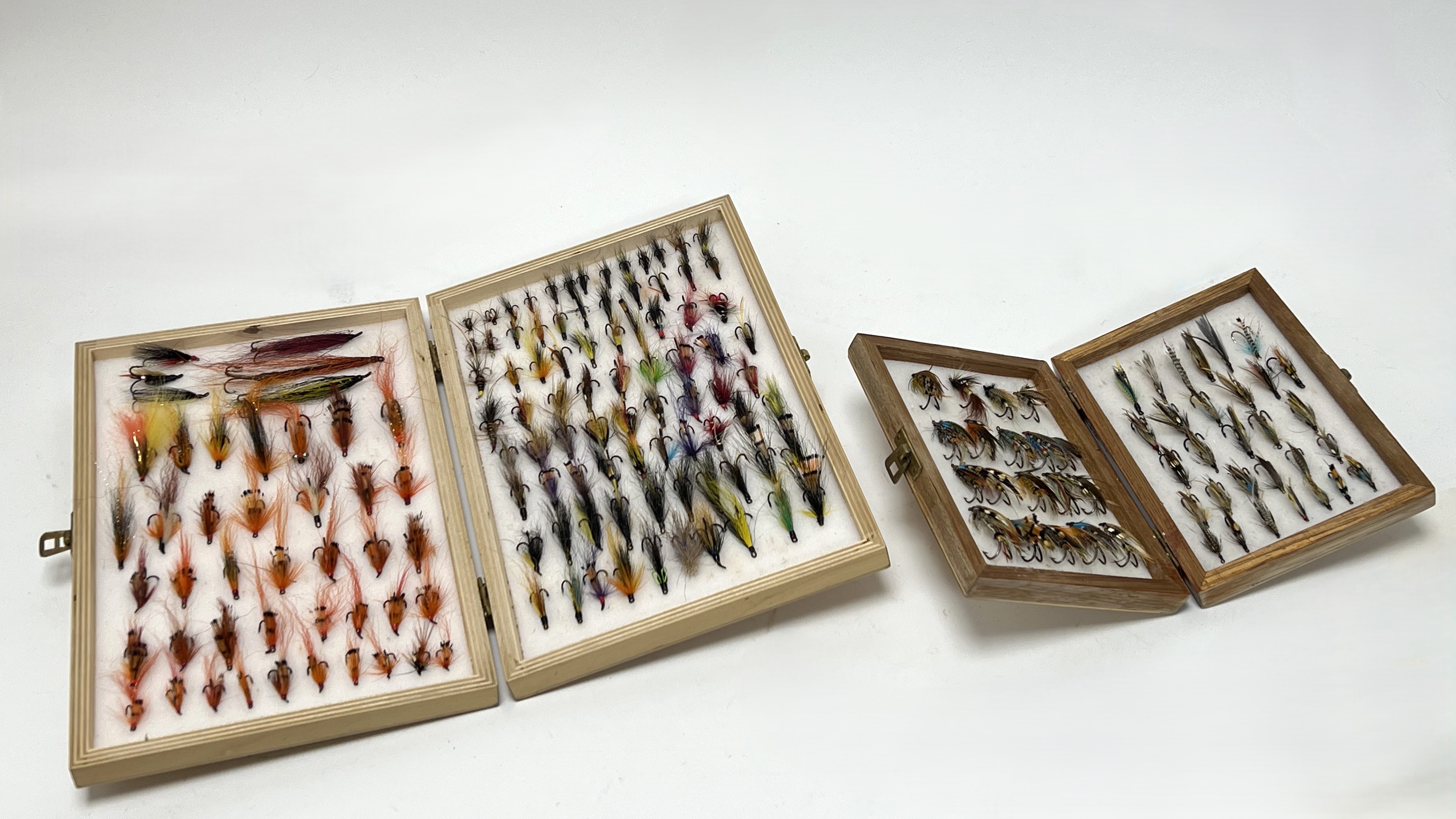 Fishing Interest - Two wooden fly boxes, one containing traditional salmon doubles, and one with a