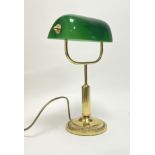 A contemporary 1920s style gold metal and green glass bankers table lamp with adjustable shade,