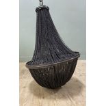 A contemporary metal chandelier, metal chain body enclosing six lightbulbs to interior (as found):