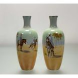 A pair of Royal Doulton vases with Orientalist decoration, c. 1920, painted by Harry Allen, each