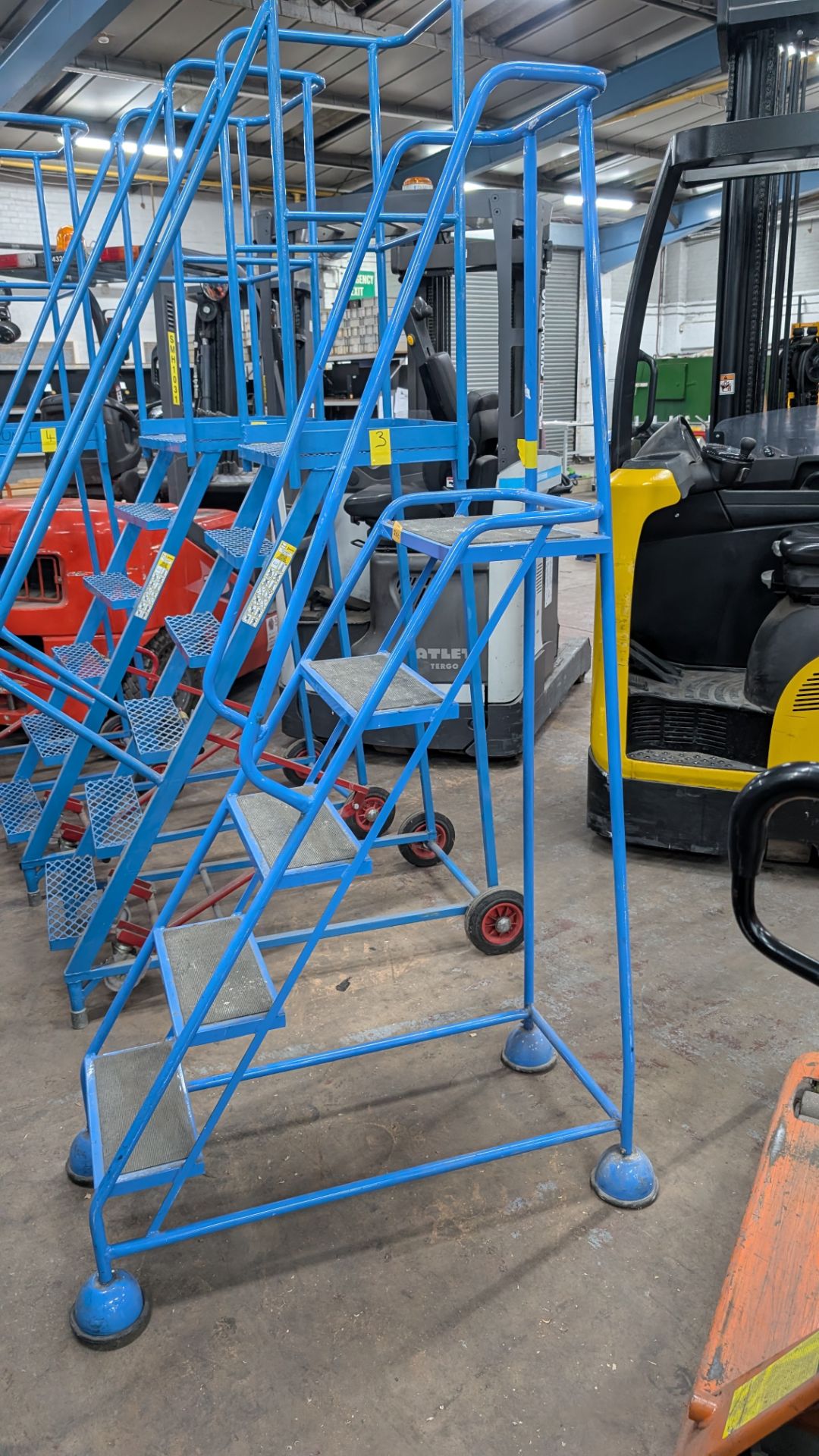 1 off Blue Metal Library Steps with handrail which brake automatically as the user ascends the steps - Image 2 of 13