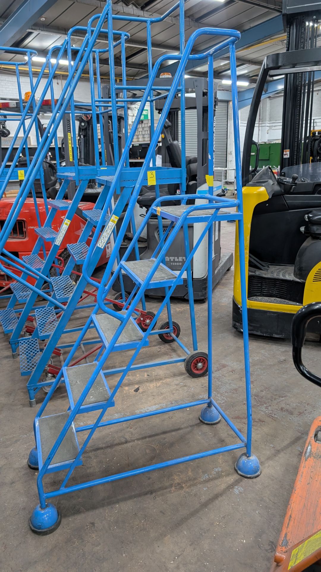 1 off Blue Metal Library Steps with handrail which brake automatically as the user ascends the steps - Image 4 of 13