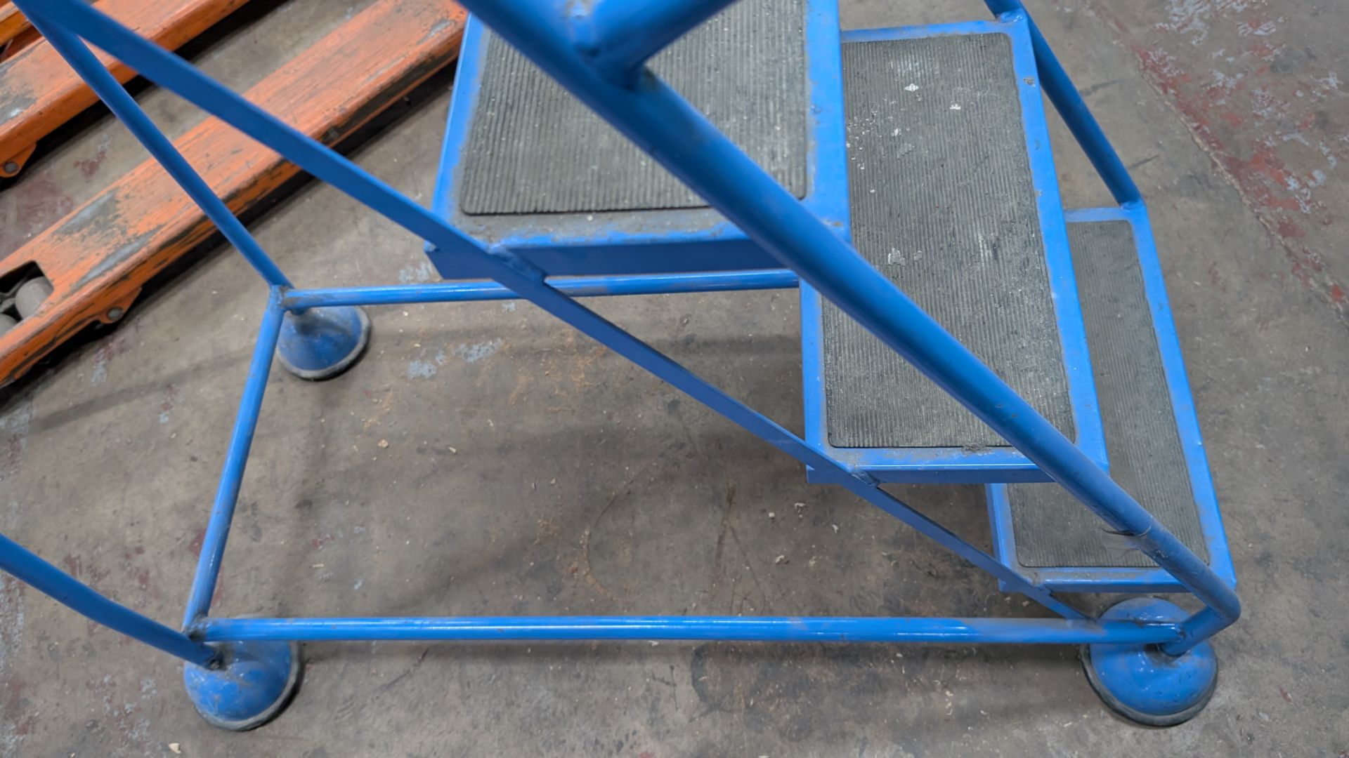 1 off Blue Metal Library Steps with handrail which brake automatically as the user ascends the steps - Image 10 of 13