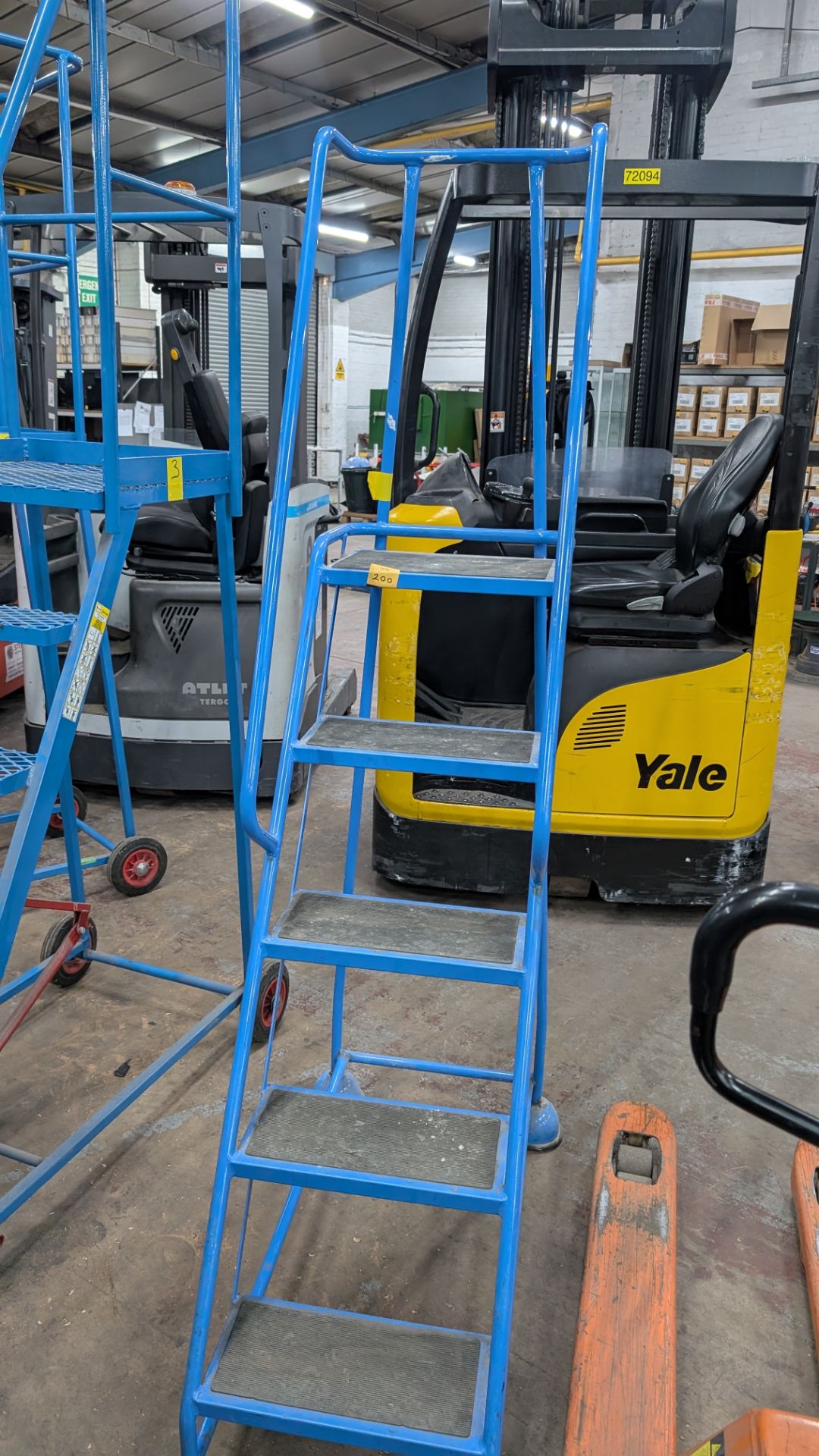 1 off Blue Metal Library Steps with handrail which brake automatically as the user ascends the steps