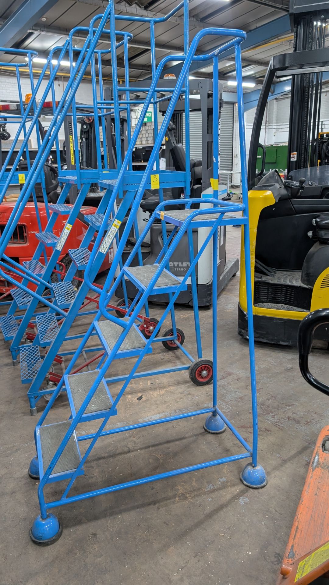 1 off Blue Metal Library Steps with handrail which brake automatically as the user ascends the steps - Image 3 of 13