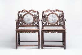 A pair of Chinese marble-inset mother-of-pearl-inlaid hongmu chairs, 19th C.