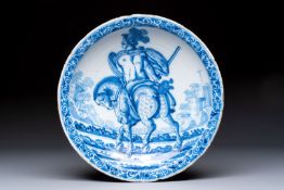A blue and white Dutch Delft 'Titus Manlius' dish, after an engraving by Hendrick Goltzius, late 17t