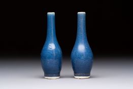 A pair of Chinese blue-glazed 'Hatcher Cargo' vases with incised dragons, Transitional period