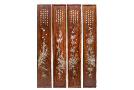 A set of four Chinese or Vietnamese mother-of-pearl-inlaid hongmu panels depicting birds among flowe