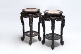 Two finely carved Chinese marble-topped hongmu stands, 19th C.