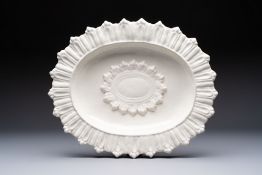 A large white-glazed 'Sunburst' oval dish, Saint-Jean-du-Desert or Marseille, France, 17th C.
