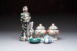 A pair of Chinese famille verte covered jars, a Tieguai Li figure, a blue and white teapot and a bis