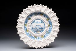 * A large polychrome French lobed 'Castle' dish, Saint-Jean-du-Désert or Marseille, France, late 17t