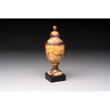 An English Blue John urn on black marble base, ca. 1900