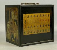MAHJONG SET, in lacquered five-drawer cabinet, two brass carrying handles, 19 (h) x 20 (w) x