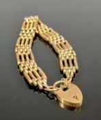 9CT ROSE GOLD GATE BRACELET, with heart shaped padlock and safety chain, 17.9gms Provenance: