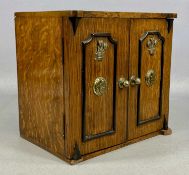 GOOD OAK TWO-DOOR TABLETOP CABINET, late 19th century, doors having brass Prince of Wales feather