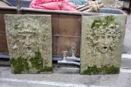 PAIR OF CAST PLASTER WALL FOUNTAINS, modelled with masks of Greek mythological beings, 74 x 50cms (
