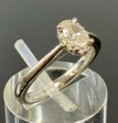 18CT WHITE GOLD OVAL DIAMOND HALO RING, principal stone approx. 4 x 3mms, size I, 3.6gms
