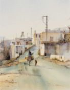 DAVID HOWELL (b. 1939) watercolour - Middle Eastern street scene with a figure riding a donkey,