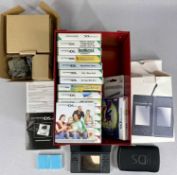 RETRO GAMING / COMPUTING: NINTENDO DS LITE, boxed, with sixteen cased games, rumble pack, and