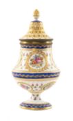 FRENCH PORCELAIN SUGAR CASTER. in the Sèvres style, painted with flowers in roundels, gilt