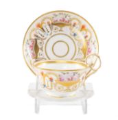 NANTGARW TEACUP & SAUCER, c. 1818-20, painted in London roses in urns between formal leaf sprays,