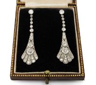 PAIR OF EARLY 20TH CENTURY DIAMOND ENCRUSTED DROP EARRINGS, 'Peacock Feather' openwork design, set