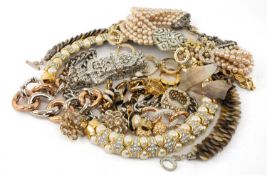 SMALL GROUP OF COSTUME JEWELLERY, including examples by Joan Collins, Carolle, possibly Nolan