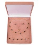 YELLOW METAL ONYX JEWELLERY SUITE, comprising necklace, bracelet, ring and pair of earrings,