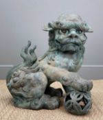 LARGE JAPANESE PATINATED BRONZE KARASHISHI, seated with brocade ball, 55cms (h) Provenance: