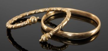 14CT TWO-COLOUR GOLD TWISTED TORQUE BANGLE, 11.1g; together with 14ct gold hollow bangle, cuff