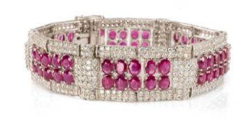 18CT WHITE GOLD RUBY & DIAMOND ENCRUSTED BRACELET, 18.5cms (l), gross wt. approx. 56g Provenance:
