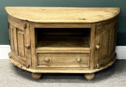 MODERN PINE DEMILUNE TV STAND, with cupboards and drawer, 62 (h) x 111 (w) x 39cms (d) Provenance: